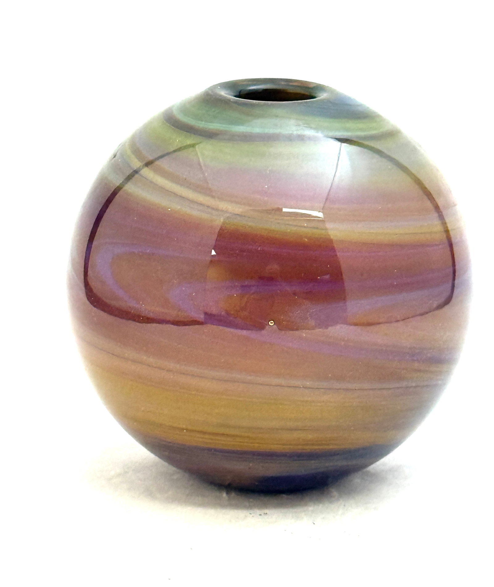 Art Reed Bulbous Art Glass Vase: Art Reed small bulbous art glass vase in swirling colors of blue, green, orange, violet, and brown, signed Art Reed 79; ht. 4" diameter 3 3/8". CONDITION: no chips, cracks, repairs, or material defect