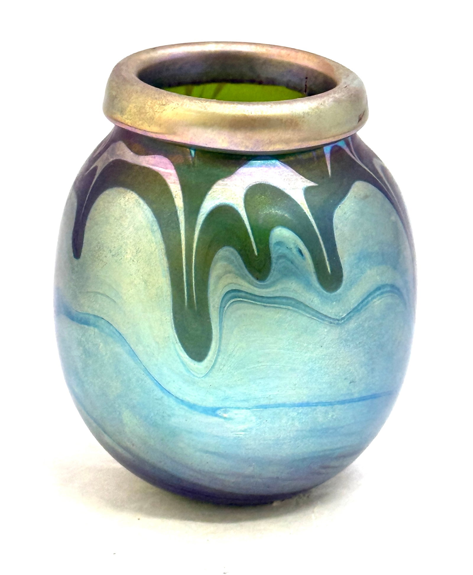 Mark Peiser Small Art Glass Vase: Mark Peiser small art glass vase with rolled rim in blue iridescent with blue and silver dripping, signed Mark Peiser 1974; ht. 3 1/2". CONDITION: no chips, cracks, repairs, or material defects
