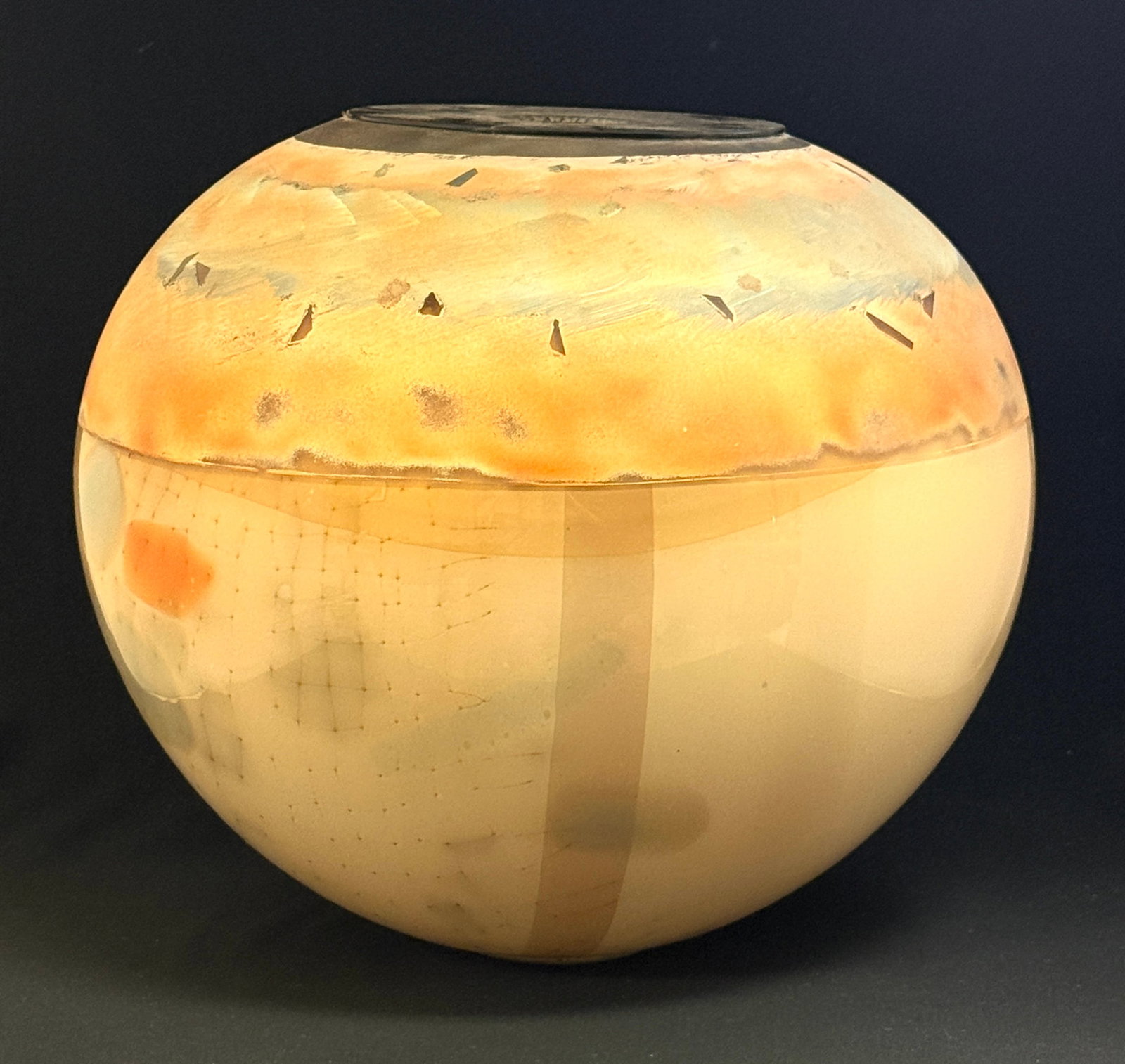 Large Palusky Art Glass Orb: Large Robert Palusky glass orb in a southwest design, signed Robert Palusky 1988, 14" ht. CONDITION: no chips, cracks, repairs, or material defects found, Jaremos attempts to call any material flaw th