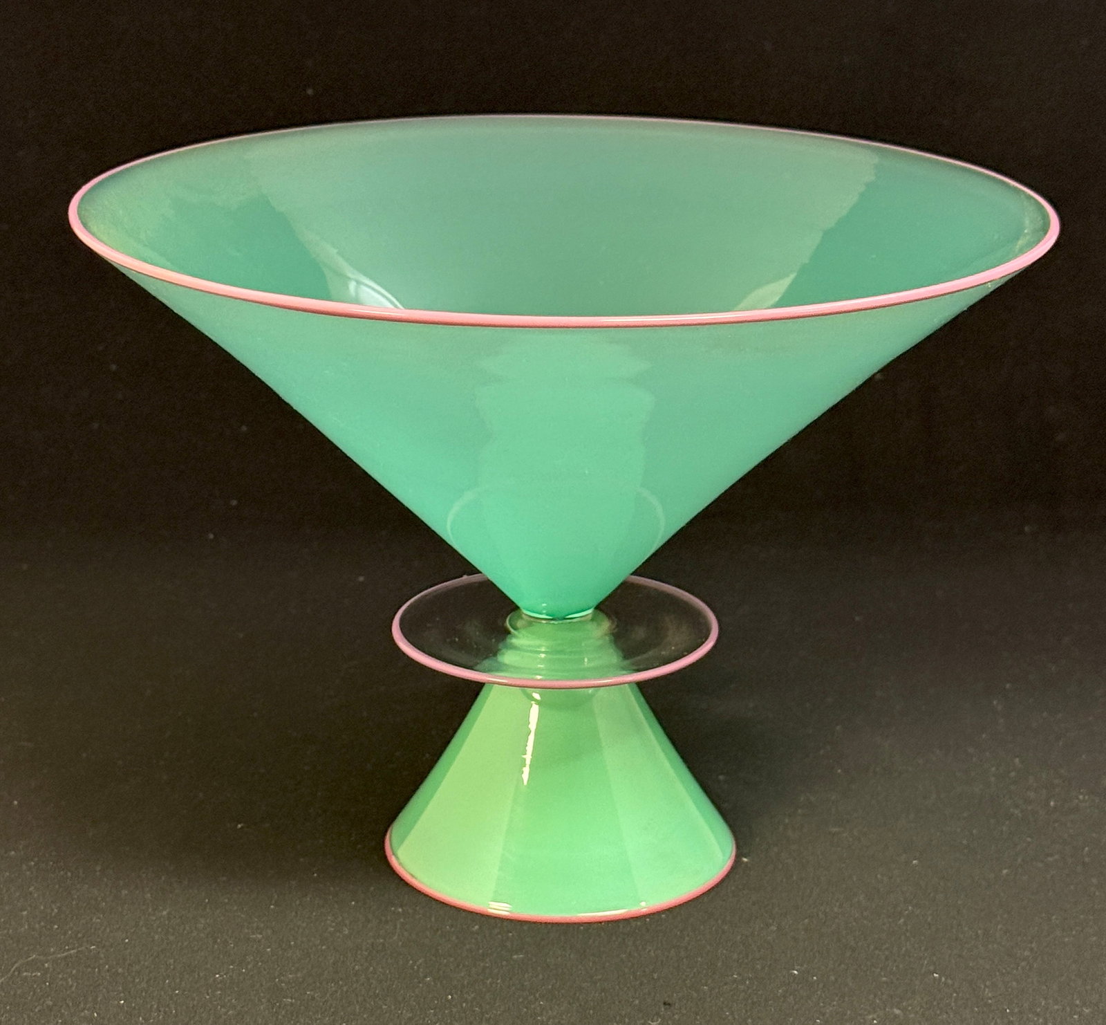 Lino Tagliapietra/Buechner Vase: Collaboration vase between Lino Tagliapietra and Thomas Buechner in a futuristic conical form in green glass with rose lip wrap, signed Tagliapietra Thomas Buechner III 1988, 7" ht. CONDITION: no chip