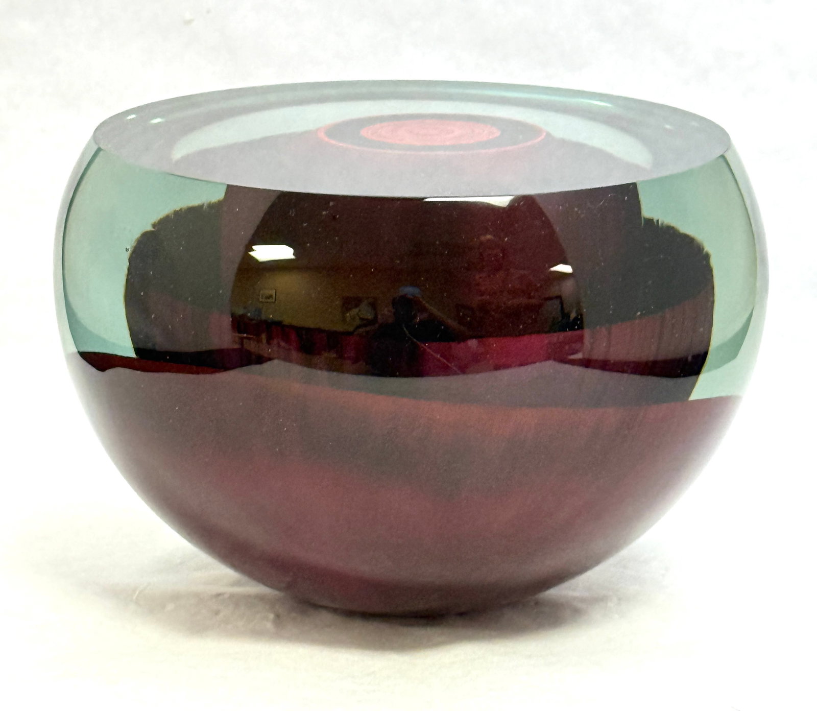 Michael Pavlik Art Glass Orb: Michael Pavlik art glass orb in turquoise glass with a red core, signed M Pavlik 1980. 8 1/2" wide. CONDITION: no chips, cracks, repairs, or material defects found, Jaremos attempts to call any