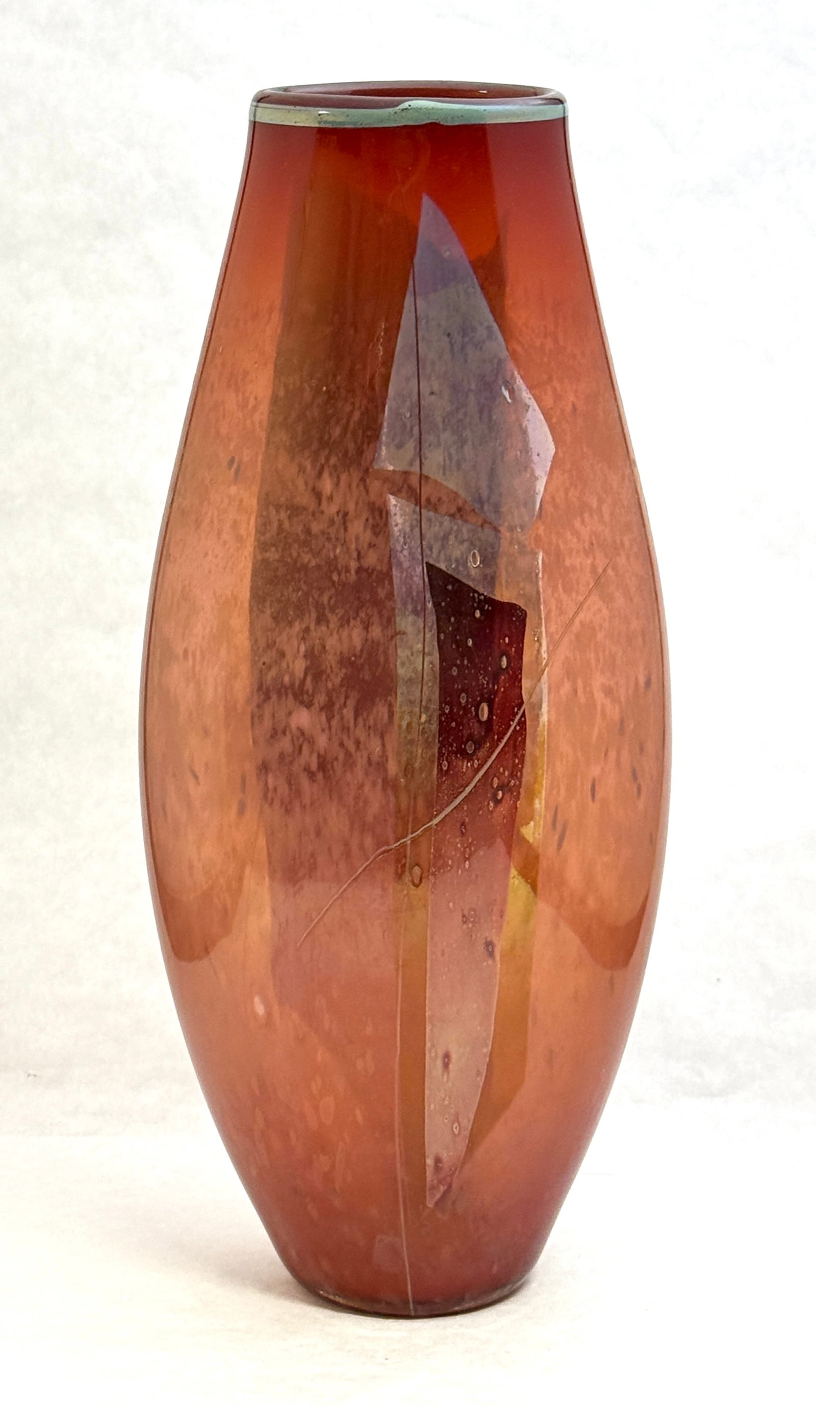 William Morris Art Glass Vase: William Morris cylindrical glass vase in mottled red with a crimson panel and accented with a blue rim, signed William Morris Stenhutta 79, 13" ht. CONDITION: no chips, cracks, repairs, or material