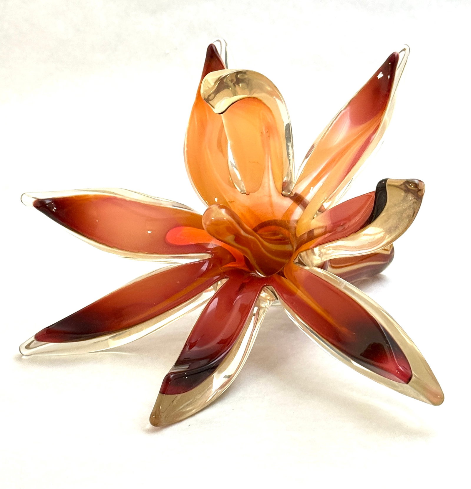 Littleton Vogel Glass Sculpture: John Littleton and Kate Vogel glass sculpture of a blooming flower, signed and dated 1985, 10" long. CONDITION: no chips, cracks, repairs, or material defects found, Jaremos attempts to call any