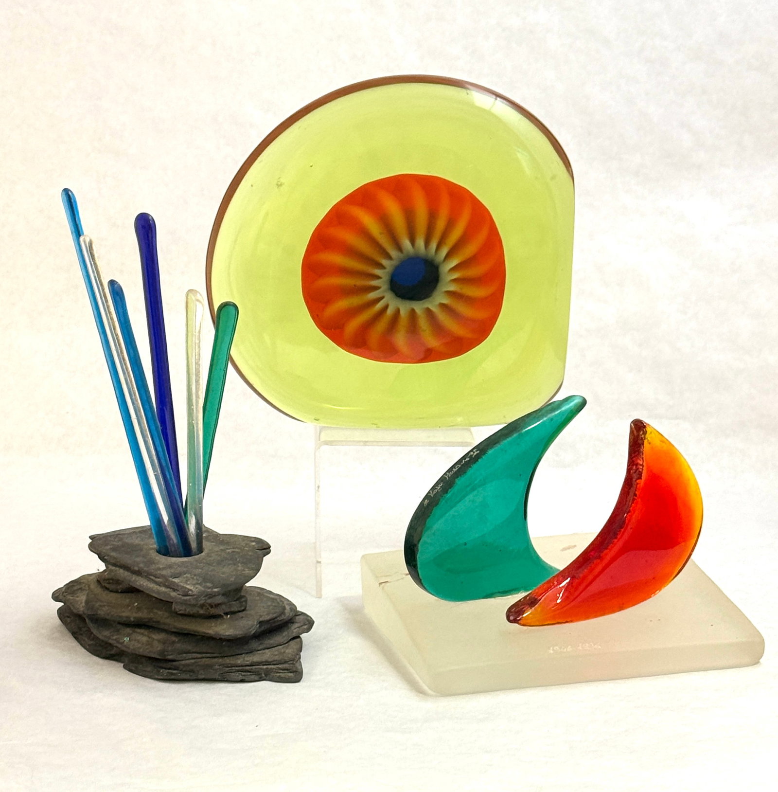 Three Art Glass Sculptures: Three Art glass sculpture including a seeing eye paperweight together with a rock with glass rods and a signed Murano sculpture with sails, Eye 6 1/2' ht. CONDITION: no chips, cracks, repairs, or mate
