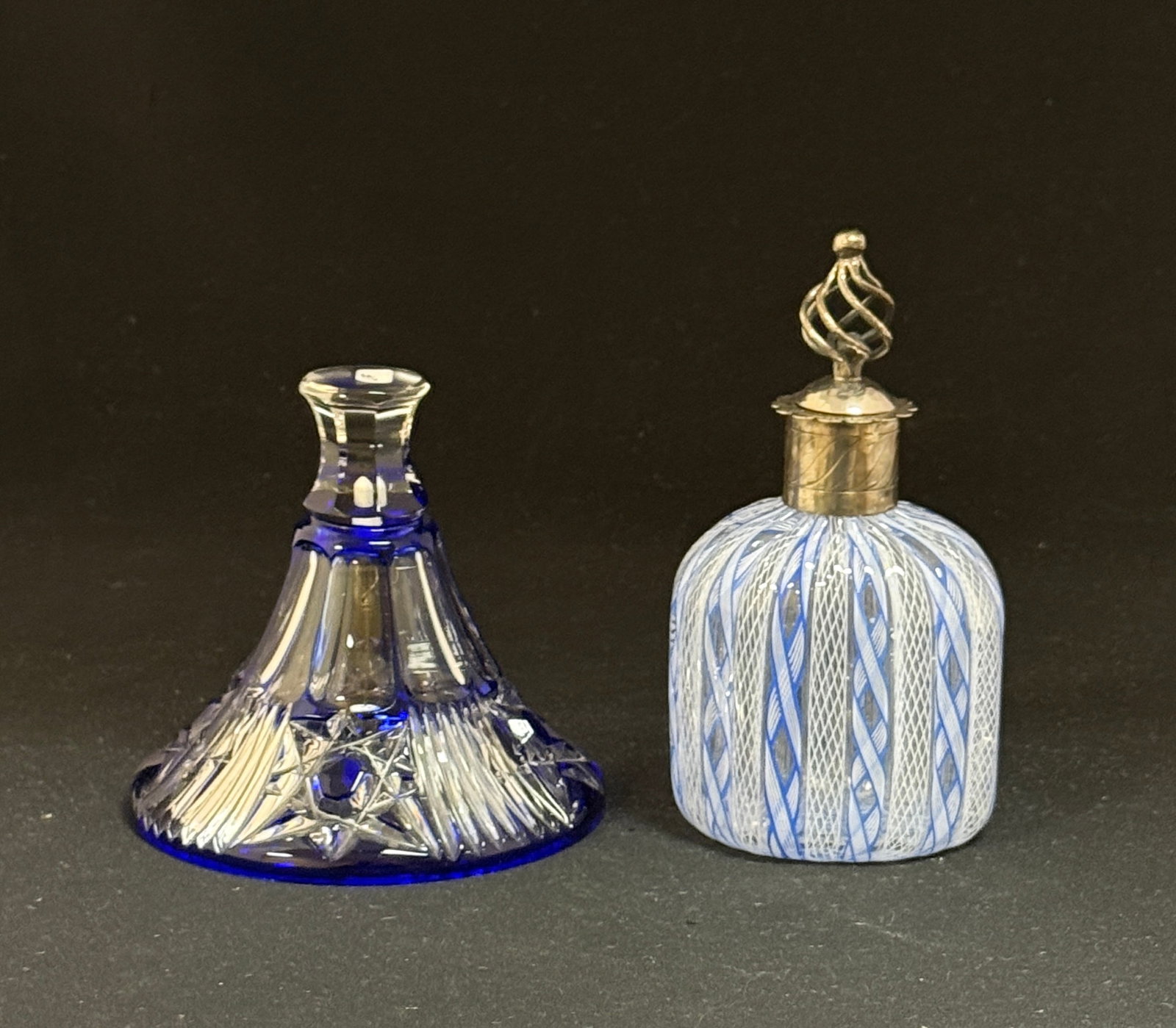 Two Contemporary items: Two contemporary glass items including a blue cut to clear bell together with a Murano perfume bottle with white and blue ribbons, ht. 5 1/2". CONDITION: no chips, cracks, repairs, or material
