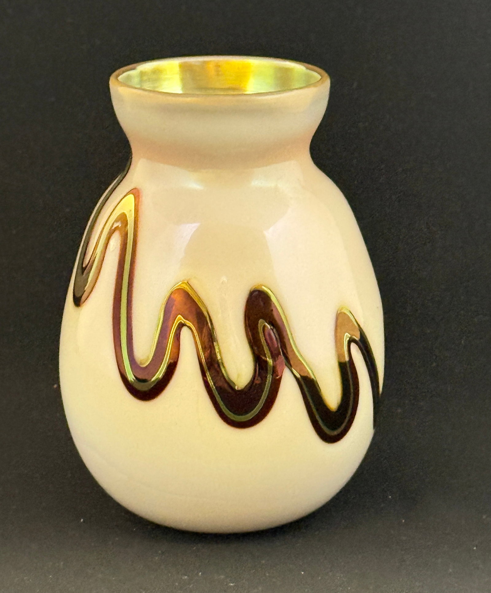 Charles Lotton Opal Glass Vase: Charles Lotton opal glass vase with an iridescent gold interior decorated with a red and gold undulating band, signed Lotton 1973, 5 1/4" ht. NOTE: Collection of Joan Allen Walker, an early collector 