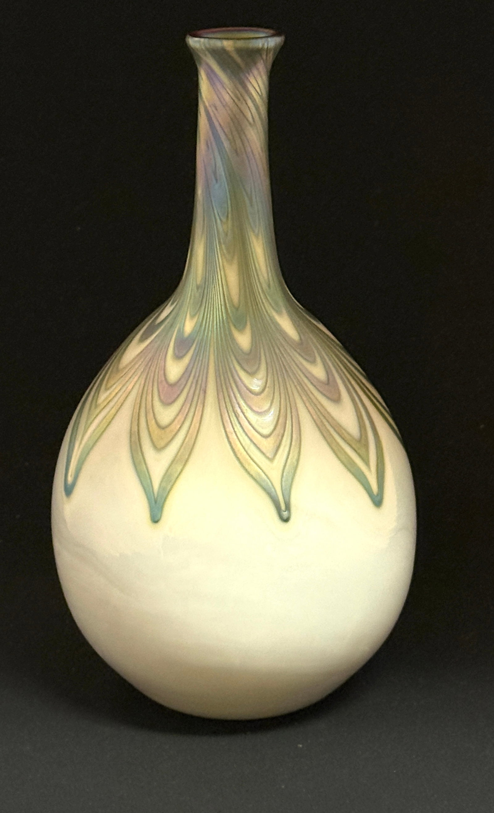 Charles Lotton Bottle Form Vase: Charles Lotton bulbous stick vase in opal with a cascading iridescent blue feather, signed Lotton 26 March 1974, 11" ht. NOTE: Collection of Joan Allen Walker, an early collector of Lotton Glass and p