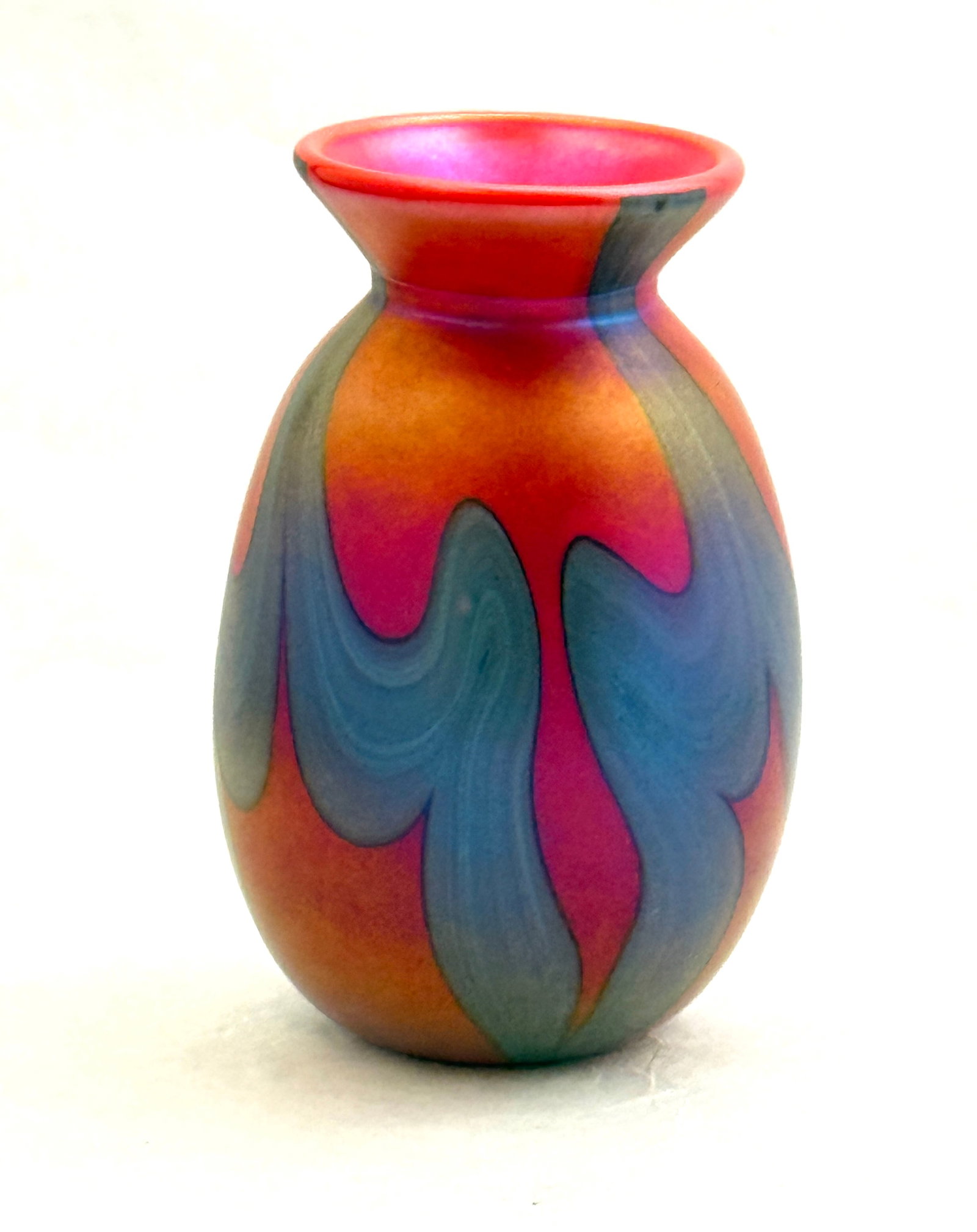Charles Lotton Mandarin: Charles Lotton mandarin red glass vase decorated with a wide blue pulled feather, signed Lotton 1973, 5" ht. NOTE: a fine executed vase to be this early. CONDITION: no chips, cracks, repairs or materi