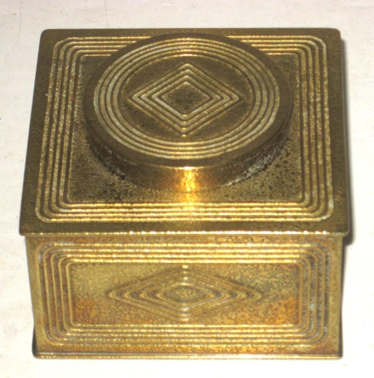 Tiffany bronze inkwell,: rectangular form in the Graduate pattern, marked Tiffany Studios New York, 3 3/4" wide.