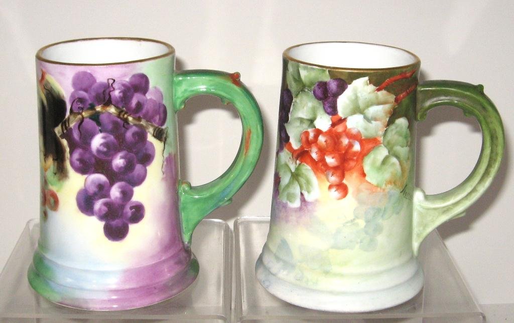Two Rosenthal tankard mugs,: each artist signed hand painted with grapes, one by Morris one by ELB, marked Rosenthal, 6" ht.