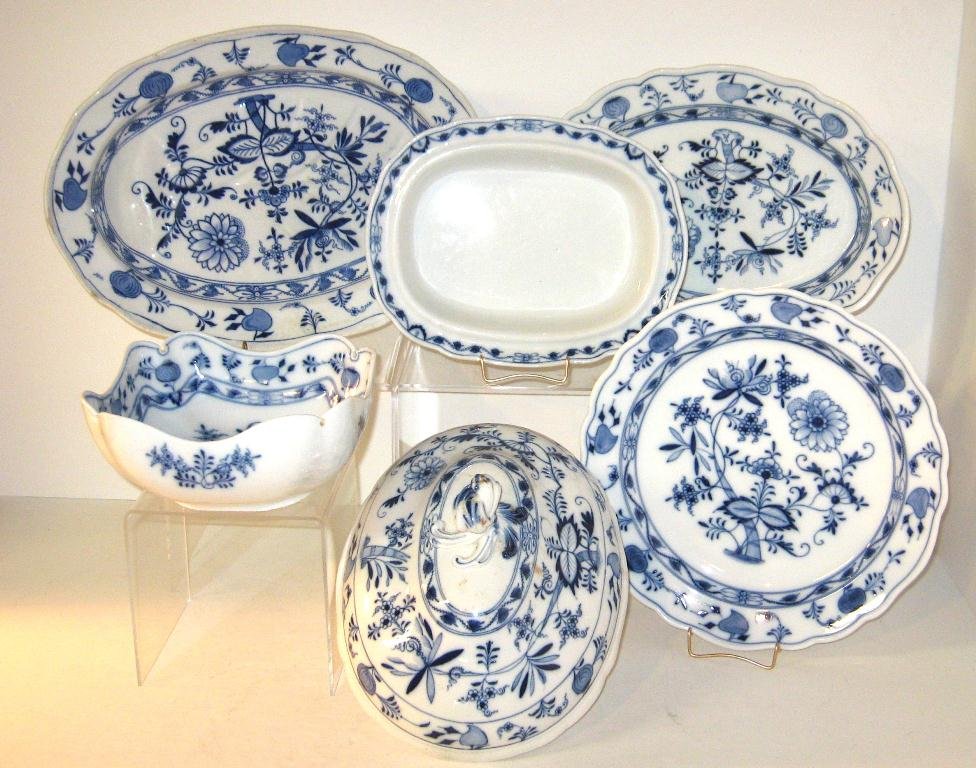 Six piece grouping of AS IS Blue Onion,: Including two oval platters, a circular platter, a two bowls, a casserole lid, 15" long.