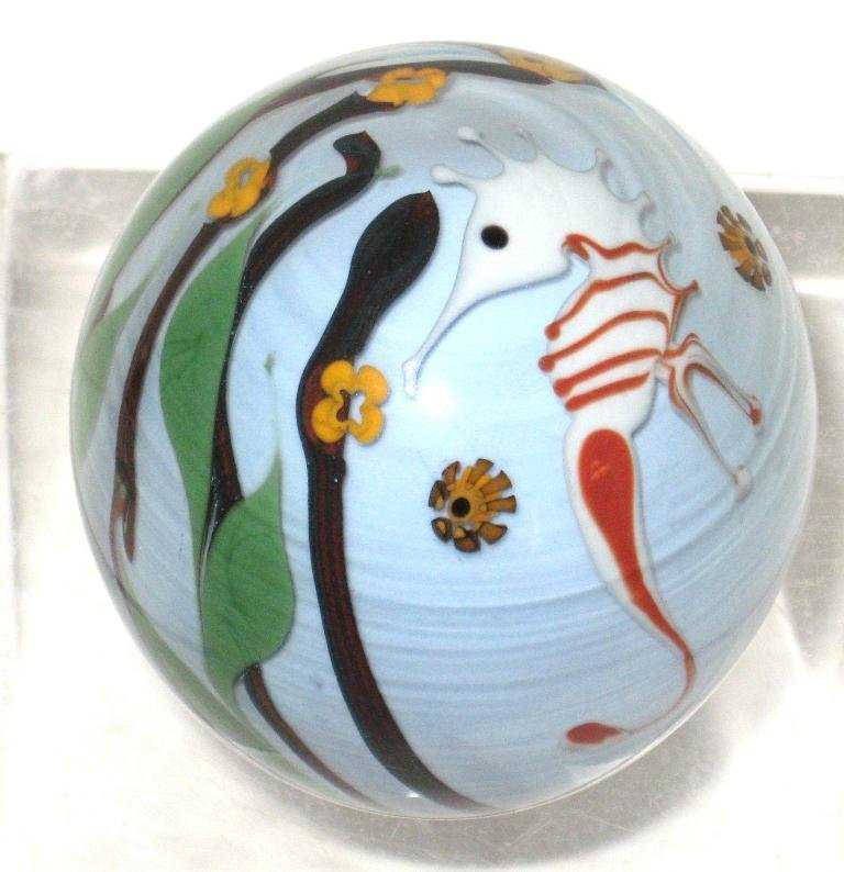Chris Buzzini paperweight,: light blue with white and red seahorse and colorful underwater foliage, signed Bridgeton studio 77 Buzzini, 3" ht.