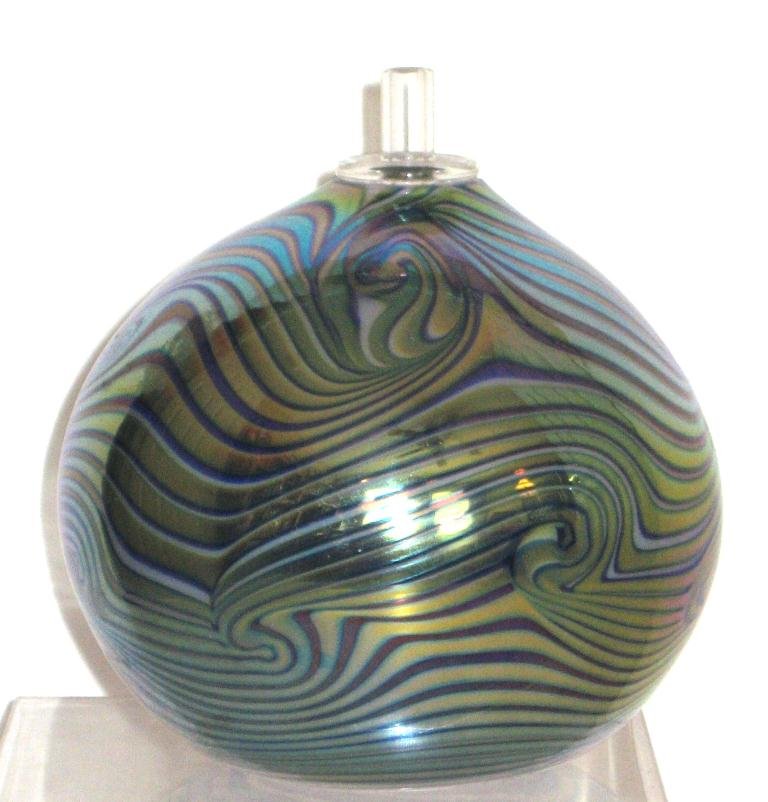 Stuart Ableman art glass oil lamp,: globular form in an iridescent gold and blue coil design, signed Abelman 06297 1996, 4 1/2" ht.