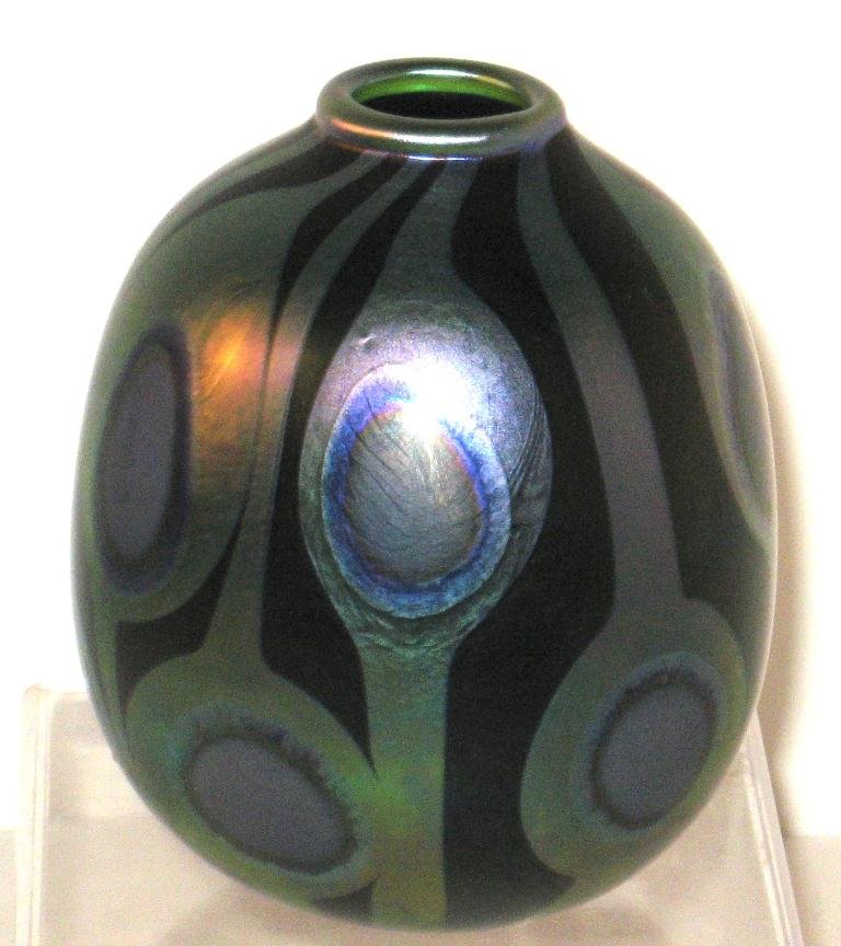 Mark Peiser Peacock eye vase,: bulbous form in iridescent cobalt decorated with iridescent gold and blue peacock eyes, marked Mark Peiser 1975, 4 1/2" ht.