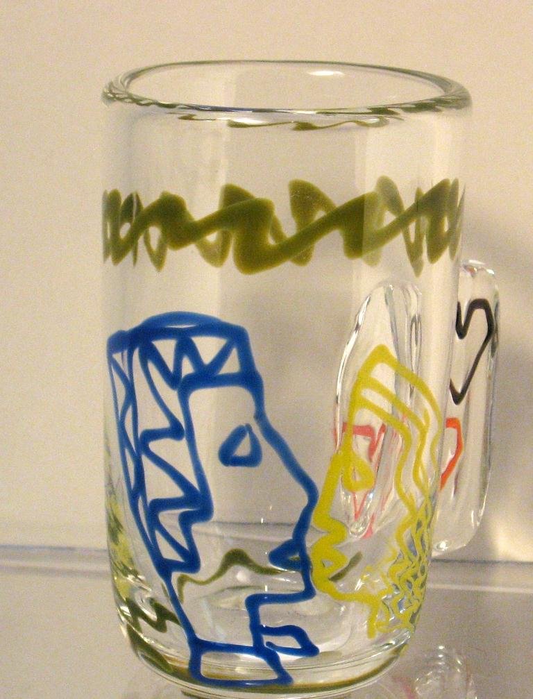 Richard Jolley art glass mug,: clear mug with internal decorated titled "The Kiss," marked Richard Jolley, 4" ht.