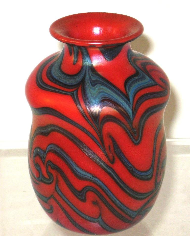 Charles Lotton red King Tut vase,: cylindrical corset form in cherry red decorated with a blue coil design, signed Lotton 1973, 4 1/2" ht.