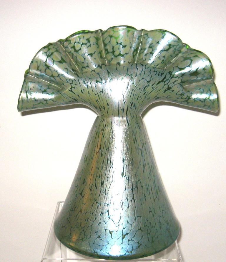 Large Loetz iridescent oil spot glass vase,: conical vase extends to a seven finger fan in green glass with a good iridescent blue oil spot finish, 13" ht.