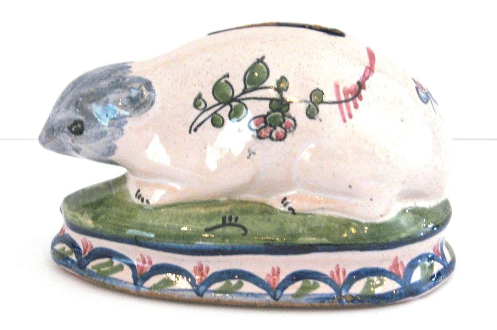 Malicorne faience mouse-form bank,: decorated with floral sprays, on raised, decorated base. No markings. Approx 6" w. c.1920.