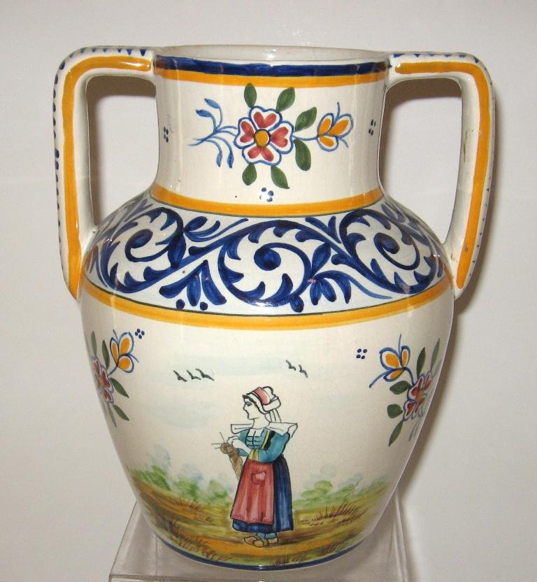 HB Quimper two handled vase with Bretonne,: dŽcor riche band, floral sprays, four dot motifs and floral bouquet painted on reverse. 8 1/4" ht. c.1925.