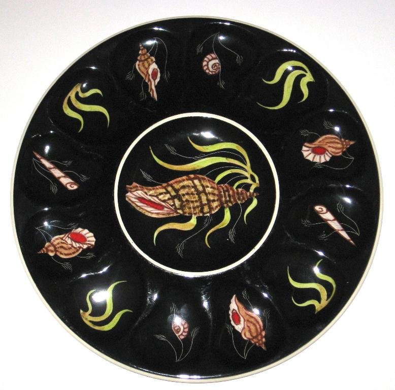 Henriot Quimper Trevoux oyster platter,: "Sea Life" design by Guy Trevoux, decorated with a myriad of seashells. Marked Henriot Quimper. 13" dia. c.1950.