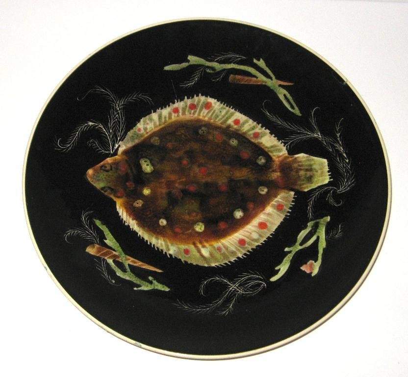 Henriot Quimper Trevoux "Sea Life" platter,: designed by Guy Trevoux, decorated with a flounder, shells and seaweed. Marked Henriot Quimper. 12" dia. c.1950.