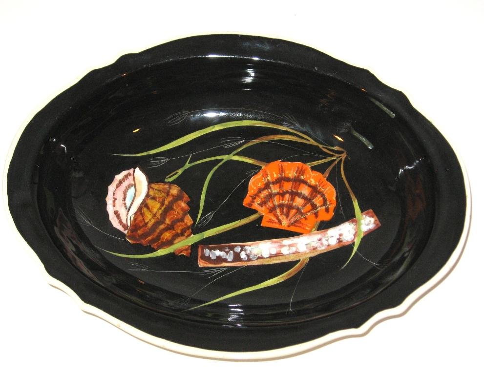Henriot Quimper Trevoux "Sea Life" bowl,: design by Guy Trevoux, oval-shaped with deep scalloped rim decorated with shells and seaweed. 11 1/4"w. c.1950.