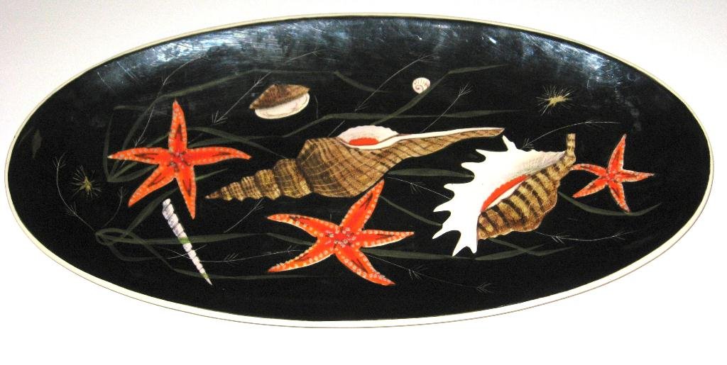 Henriot Quimper Trevoux "Sea Life" fish platter,: design by Guy Trevoux, decorated with starfish, shells and seaweed. 22"l. c.1950.