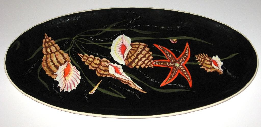 Henriot Quimper Trevoux "Sea Life" fish platter,: design by Guy Trevoux, decorated with starfish, shells and seaweed. 22"l. c.1950.