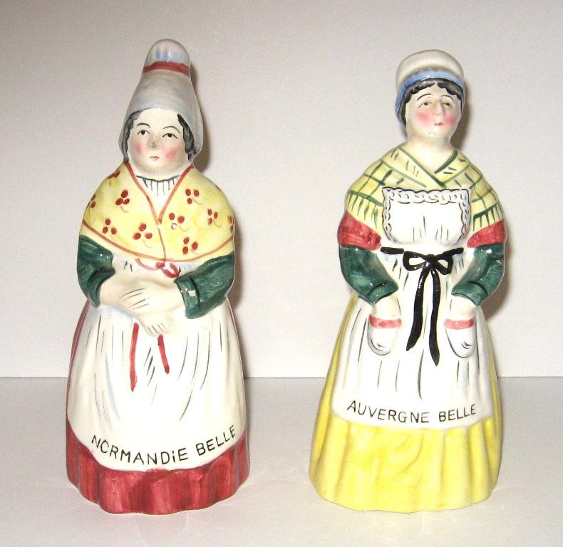 (2) French faience Bretonne figural bells,: in traditional costumes of Normandie and Auvergne, as marked. Possibly Desvres production. Approx. 8" ht. c.1930-1940.