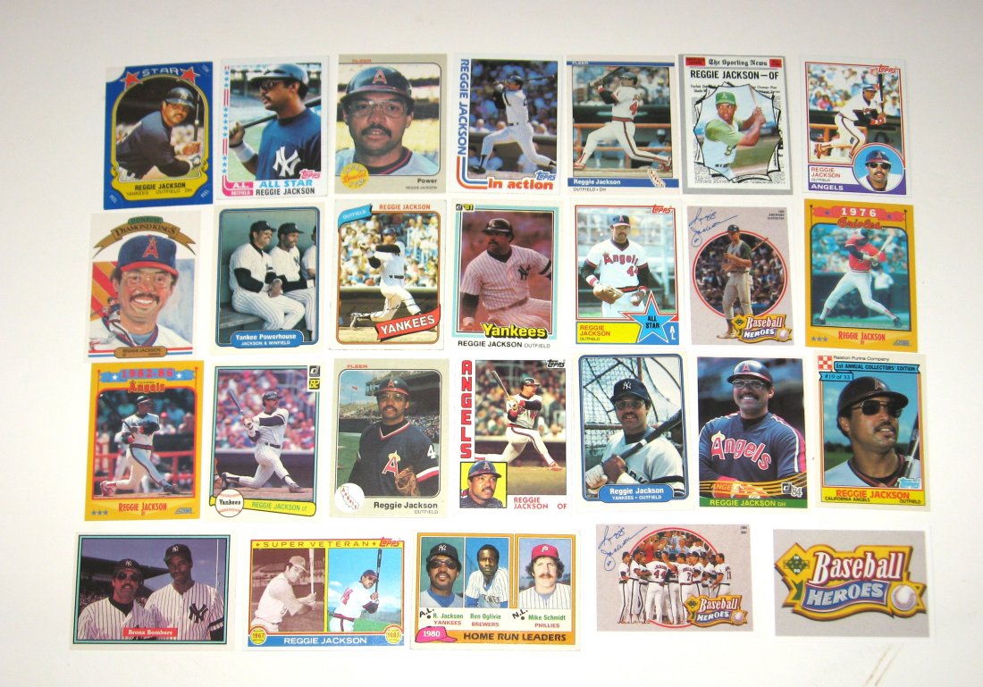 26 Reggie Jackson baseball cards,: various years and makers.