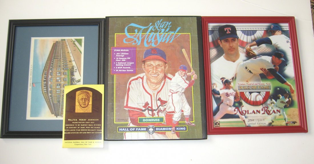 Three framed Baseball pictures,: including a Nolan Ryan Hall of Fame collage 234 out of 5000, a Stan Musial puzzle, and a framed picture of Ebbets Field. Together with a Walter Johnson Hall of Fame postcard.