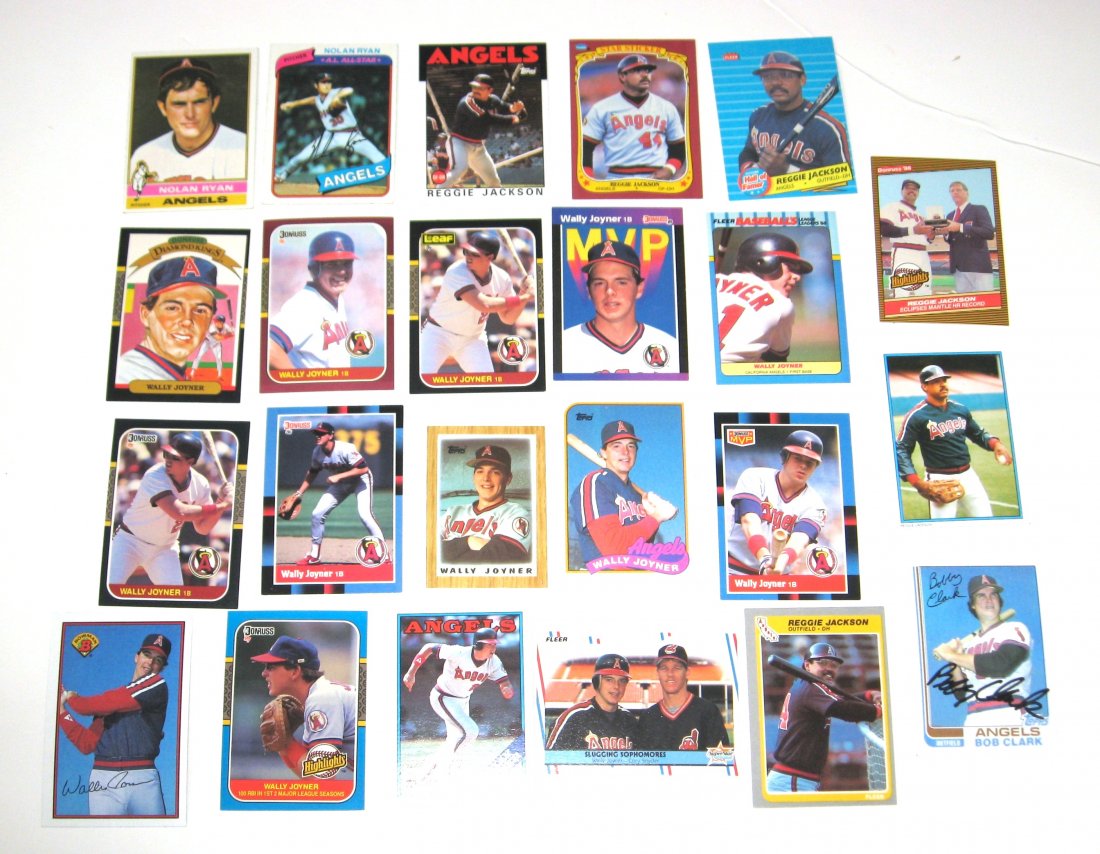 23 California Angel baseball cards,: including an autograph 1982 Bob Clark, six Reggie Jackson card, two Nolan Ryan and 14 Wally Joyner including a Leaf and Donruss rookie, various makers and years.