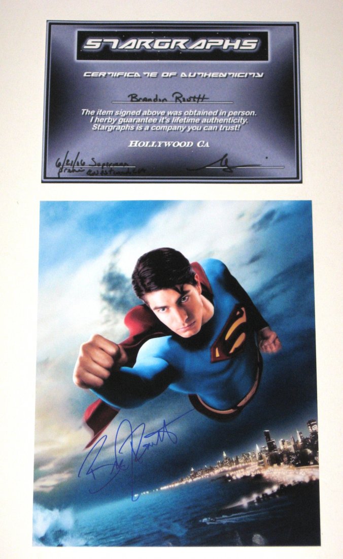 Brandon Routh autograph photo,: 8 by 10 photo with Routh as Superman, Certificate of Authenticity personally acquired 6/21/06.
