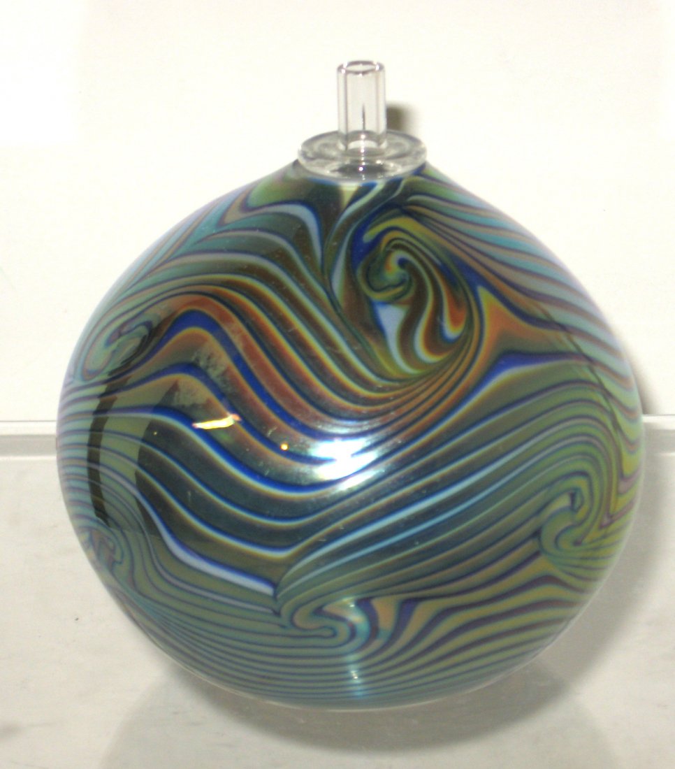 Stuart Ableman glass perfume burner,: globular form in iridescent blue decorated with a King Tut coil design, signed Stuart Ableman, 4" ht.