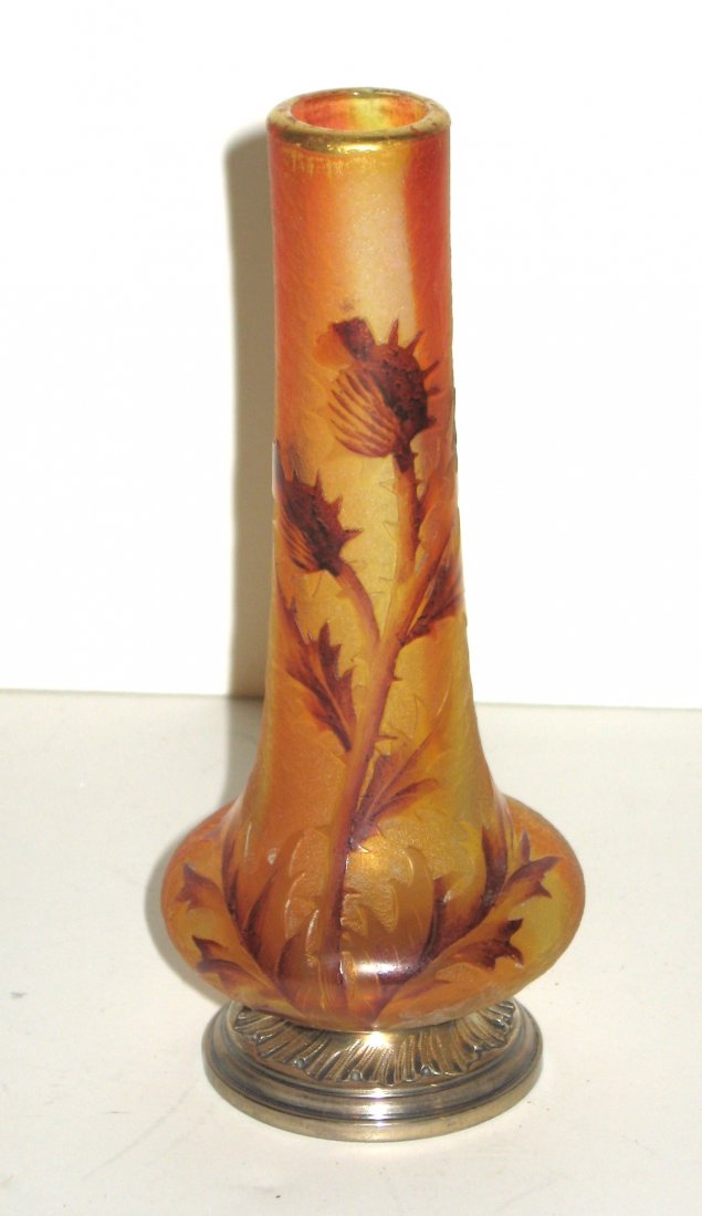 Daum Nancy French cameo vase,: bulbous stick form in textured amber and rose decorated with a cascading thistle branch, glass vase is attached to a metal base, signed Daum Nancy, 5" ht.