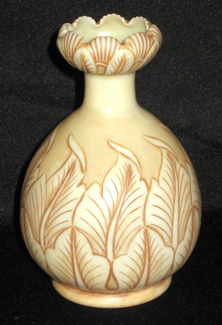 Webb Ivory cameo glass vase,: bulbous stick form with a shell formed scalloped rim decorated with cameo leaves, signed Thomas Webb and Sons, 5" ht.