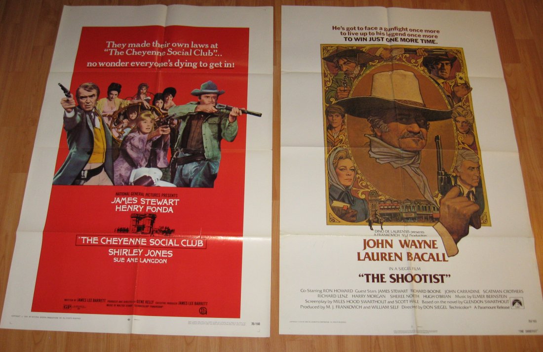John Wayne, Jimmy Stewart movie posters,: Original 1970 poster of the "Cheyenne Social Club" staring Jimmy Stewart, Shirley Jones, and Henry Fonda, together with a John Wayne poster from the 1976 movie "The Shootist" also starring Jimmy Stewa