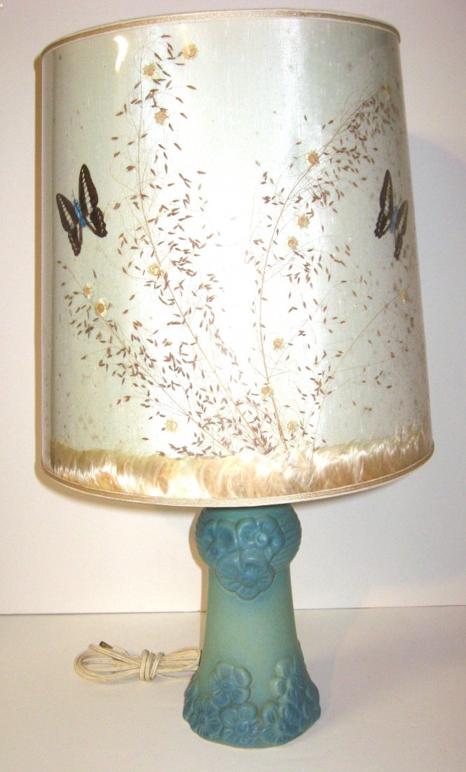 Van Briggle pottery lamp,: Green shading to blue lamp base with Primrose flowers, with original milkweed silk and butterfly shade, in sized mark AV, pottery 11" ht. overall 23" ht.
