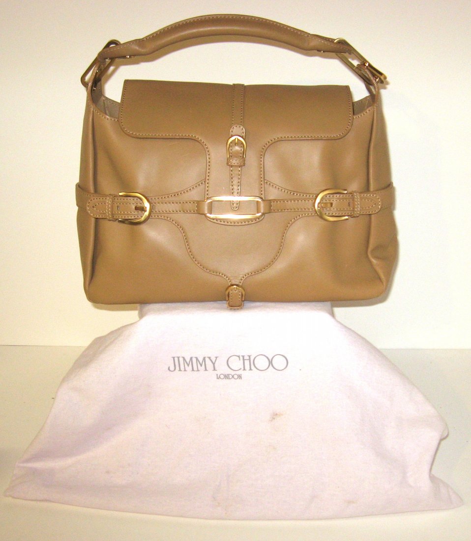 Jimmy Choo brown leather bag,: Large brown bag with gilt metal buckles marked Jimmy Choo, has original cloth bag, 14 wide by 9" ht not counting the handle.