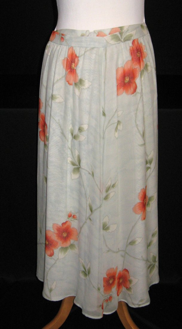 Giorgio Armani Silk skirt,: Green silt skit adorned with red flowers, right side slit starts 14" down from the waist, marked Giorgio Armani Made in Italy,