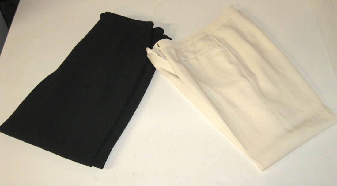 Two pair of Giorgio Armani pants,: Both lined size 42, white pair with back pockets, marked Giorgio Armani Made in Italy.