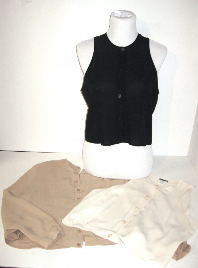 Three Giorgio Armani Silk blouses,: Including a tan cream, long sleeve tan and a tan black, all 100% silk, all size 38.