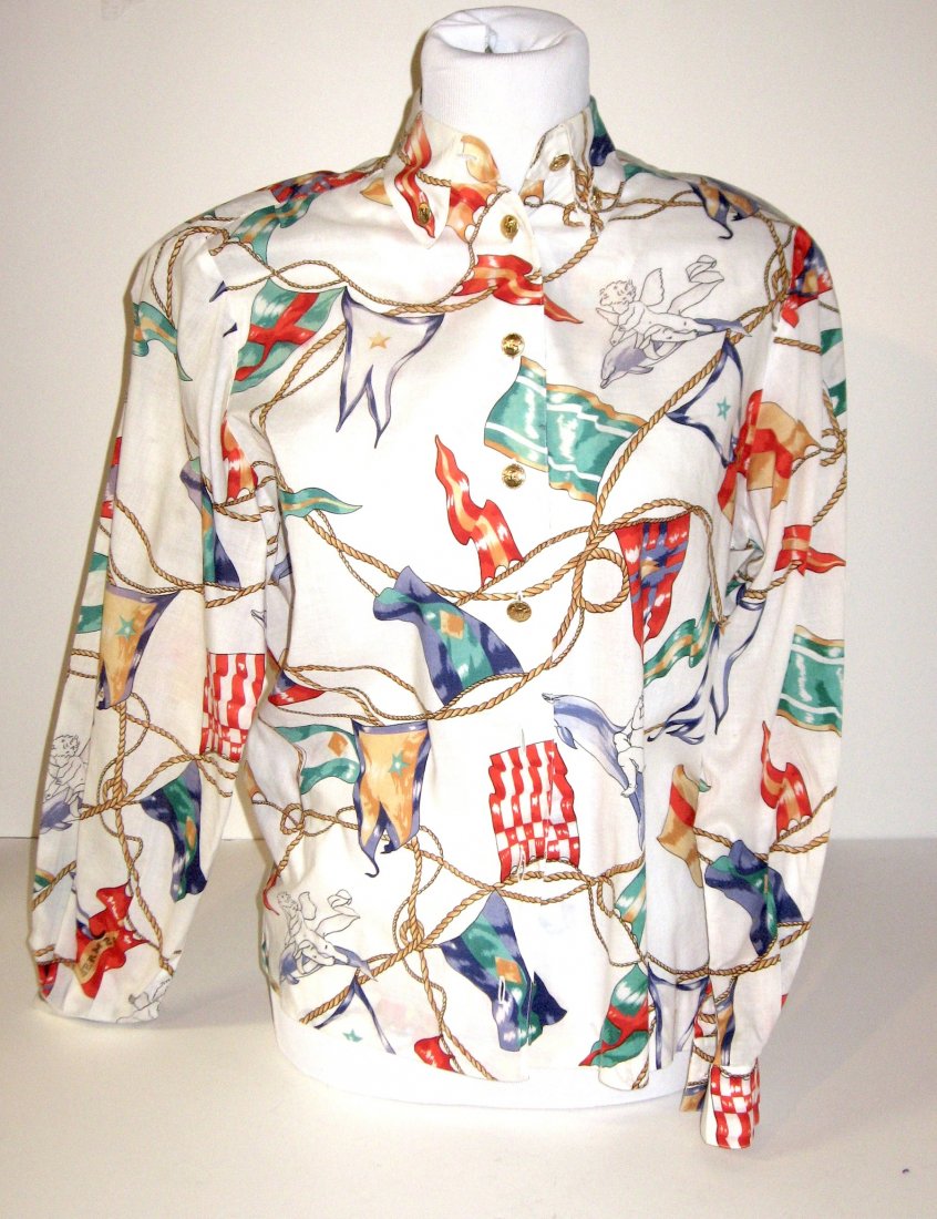 Hermes Women's cotton shirt,: White shirt with nautical flags adorned with eight factory gold tone buttons and two collar and two sleeve buttons, 12 in all, size 40.