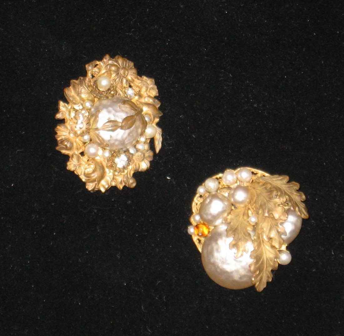 Two Miriam Haskell gold tone broaches,: both with gold leaves and pearl and jeweled flowers, both marked Miriam Haskell, largest 2" ht.