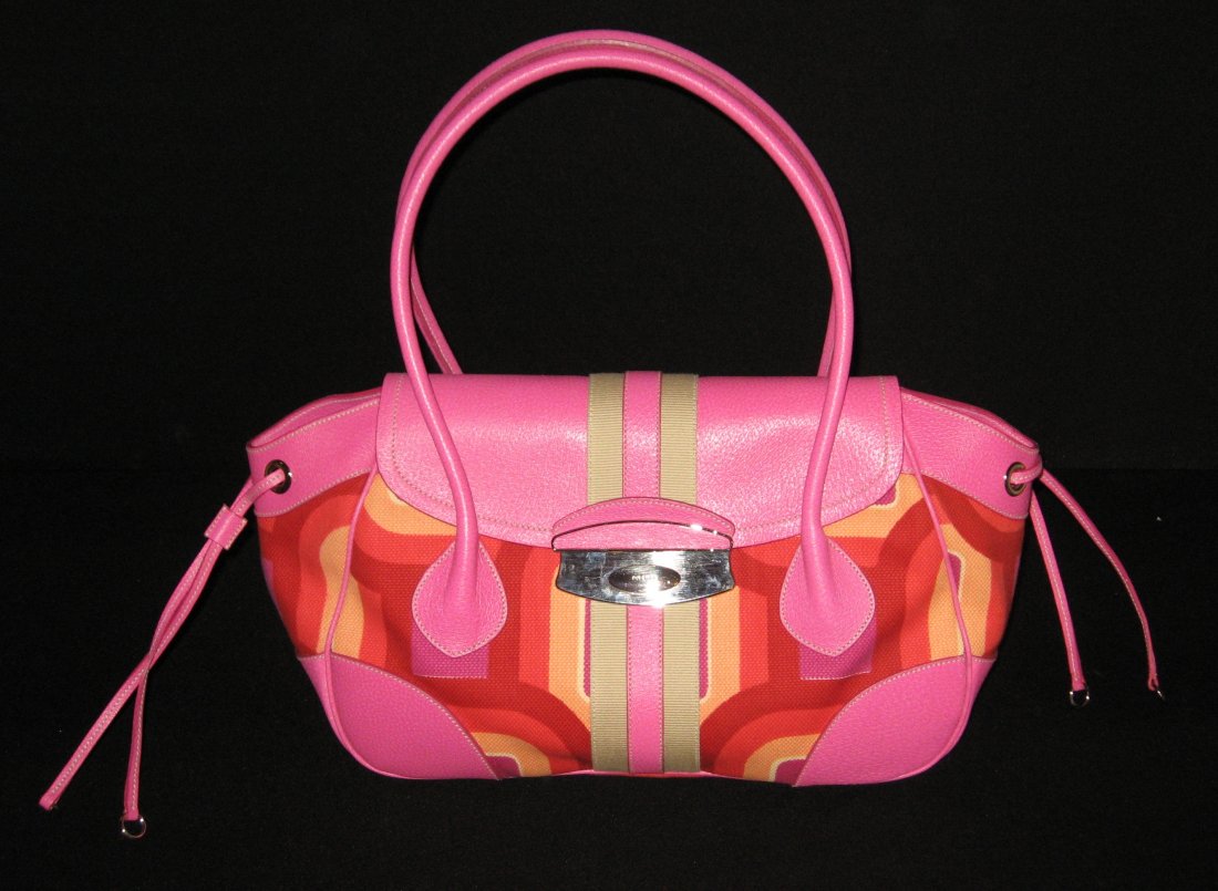 Large Prada pink tote purse,: Pink leather with pastel highlights in yellow, Crimson and red, marked on the silver clasp Prada, interior with factory emblem pink material and pink nameplate Prada, without the handle 18" long by 10