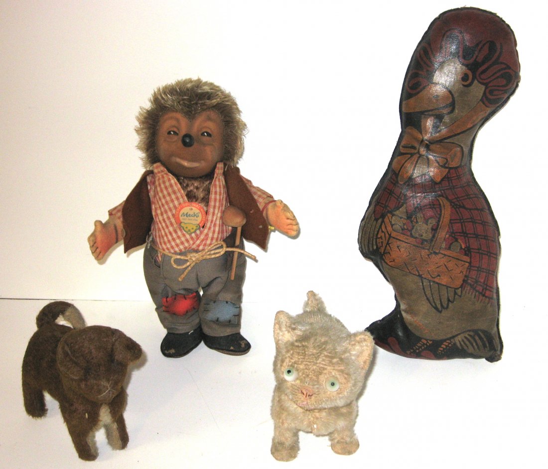 Steiff Mecki hedgehog and three friends.: Four early toys including a Steiff Mecki hedgehog, with an attributed Steiff cat with glass eyes, an early dog, and a Mother Goose, tallest 13" ht.