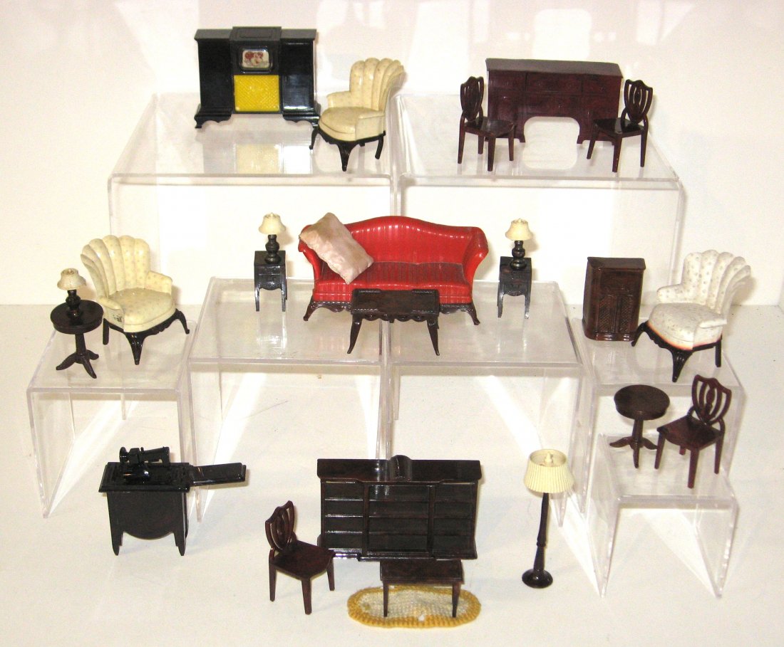 Group of 1950's mostly Renwal furniture: Including a red sofa, three soft chairs a TV with Mickey mouse, sewing machine lamps and more.