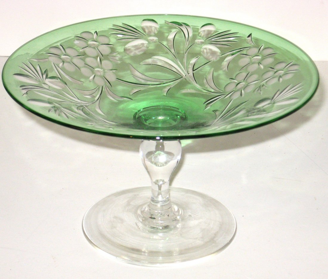 Pairpoint green cut to clear compote,: footed translucent stem with a green compote cut with stemmed flowers, attributed to Pairpoint 7 1/2" wide.