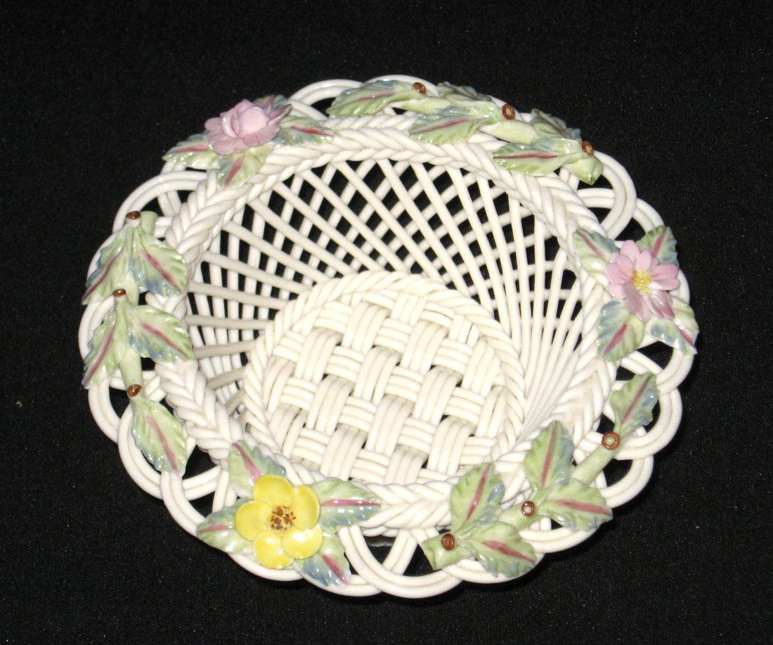 Belleek Summer Rose three strand basket: round reticulated basket adorned with pink and yellow flowers on green stems, 9th mark, 5 1/4' wide.