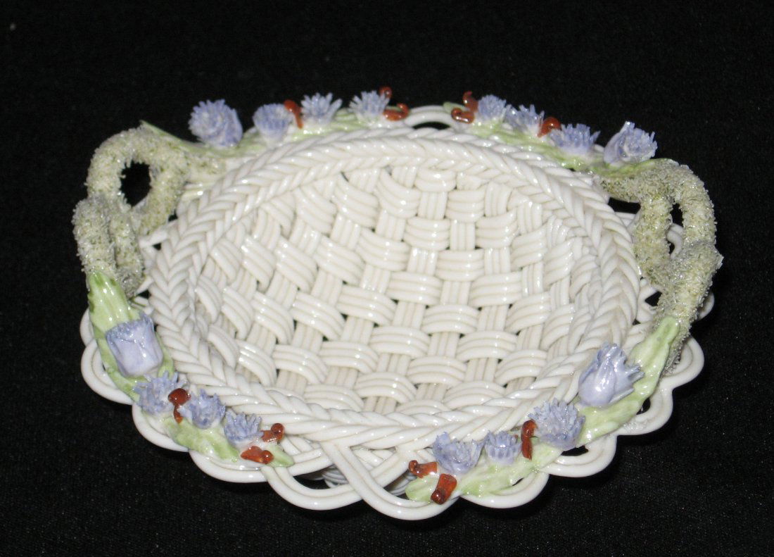 Belleek Thistle three stand basket,: adorned with green handles and lovely purple thistles, 9th mark, 5" wide.